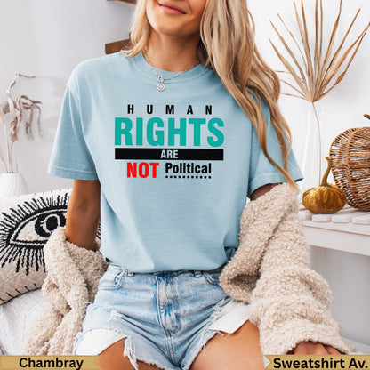 Light blue t-shirt with "HUMAN RIGHTS ARE NOT Political" text in black and red.