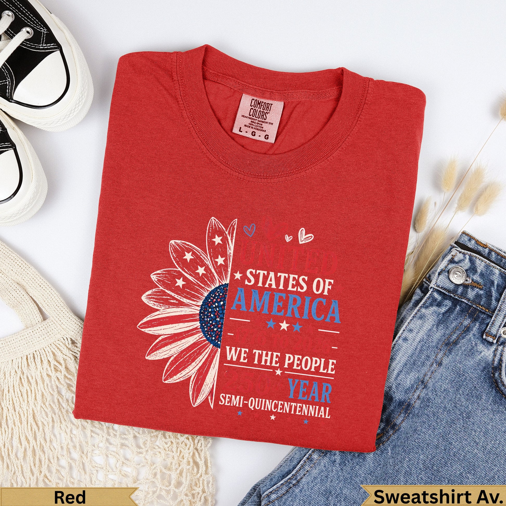Red t-shirt with "States of America, We the People" text and sunflower design.