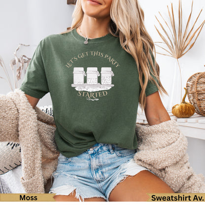 Green t-shirt with "Let's Get This Party Started" text over mason jars.