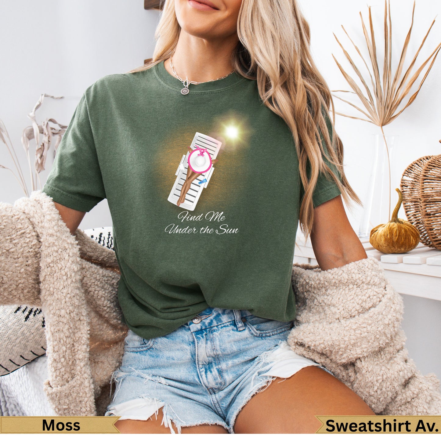 Olive green t-shirt with "Find Me Under the Sun" text and lounge chair graphic.