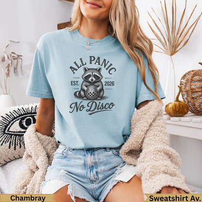 Light blue t-shirt with "All Panic No Disco" and a disco ball raccoon graphic.