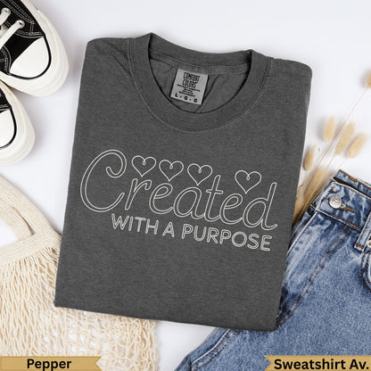 Charcoal Comfort Colors t-shirt with "Created WITH A PURPOSE" graphic.