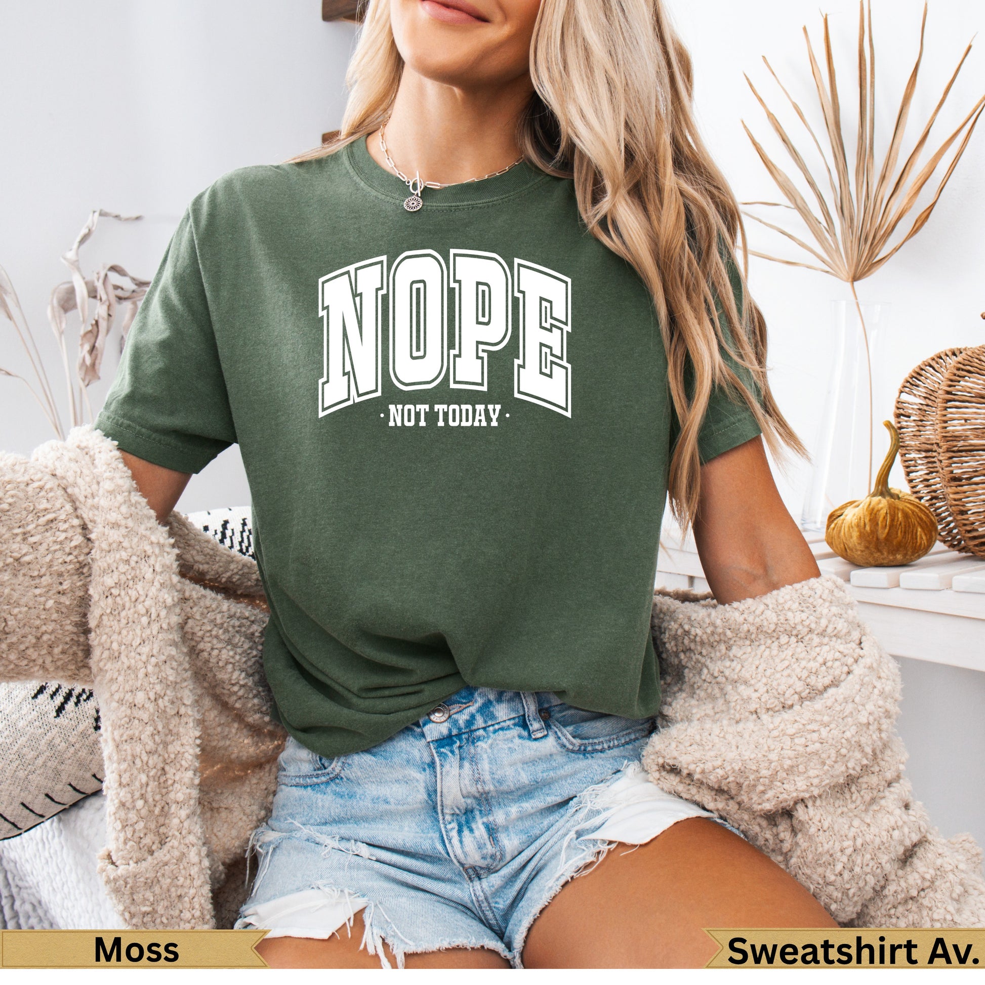 Olive green t-shirt with "NOPE NOT TODAY" graphic print.