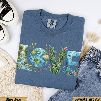 Blue sweatshirt with "LOVE" design featuring nature scenes and the Earth.