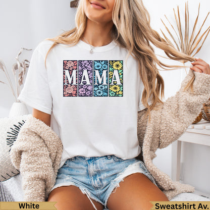 White t-shirt with "MAMA" in floral patterned squares.