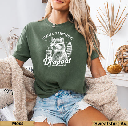 Green t-shirt with "Gentle Parenting Dropout" graphic and iced coffee illustration.