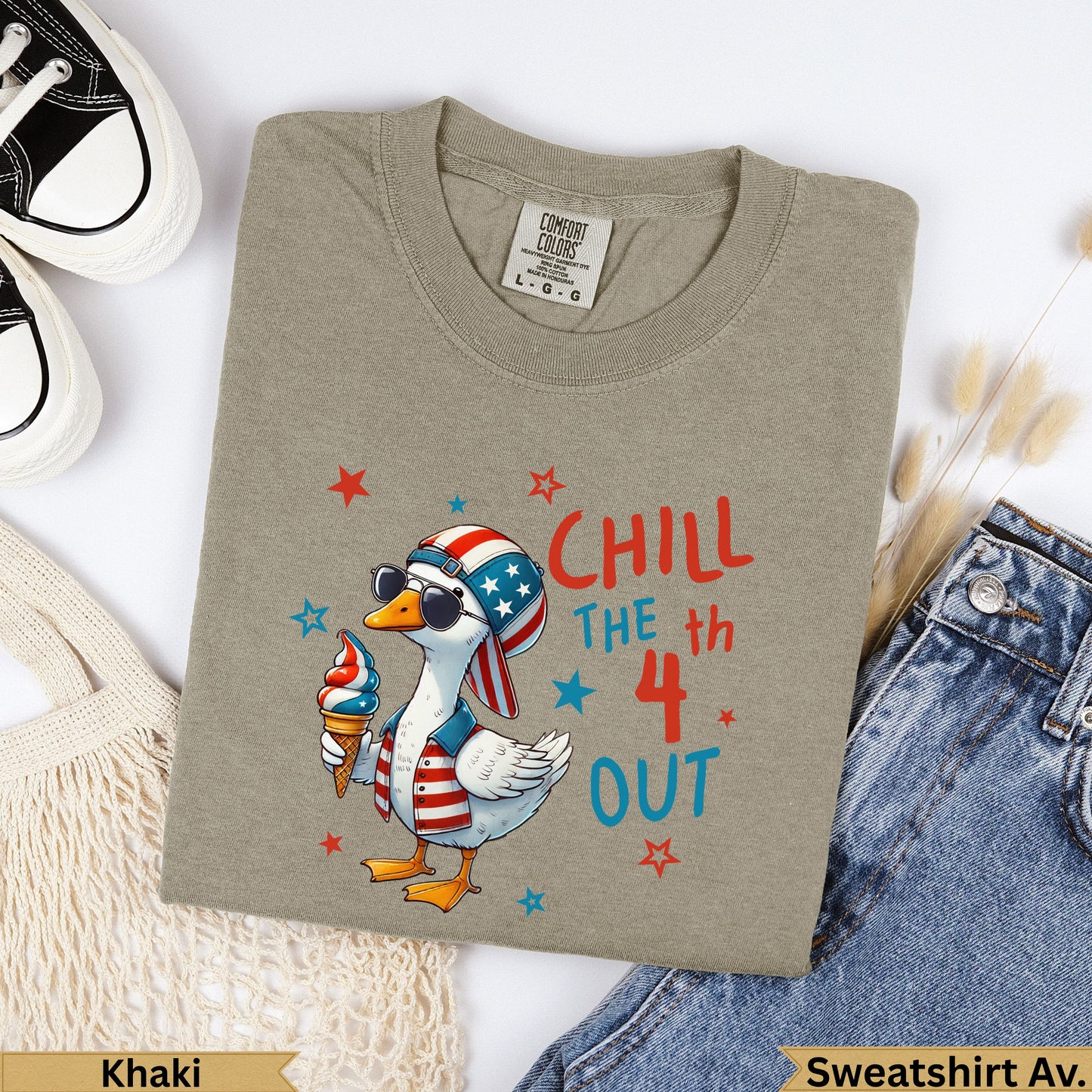 Khaki t-shirt with a cartoon duck wearing sunglasses and holding an ice cream cone, text reads "CHILL THE 4th OUT".