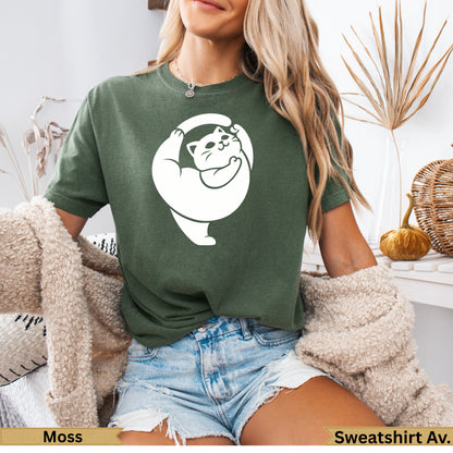 Green t-shirt with white cat yoga pose graphic on chest.