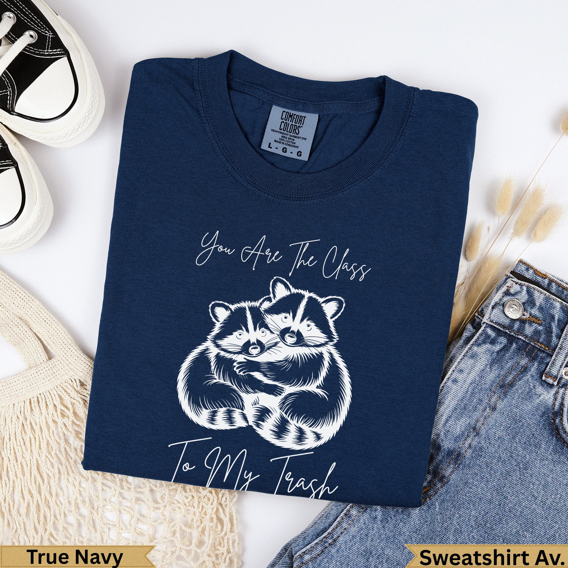 Navy blue sweatshirt with two raccoons hugging and text "You Are The Class To My Trash".