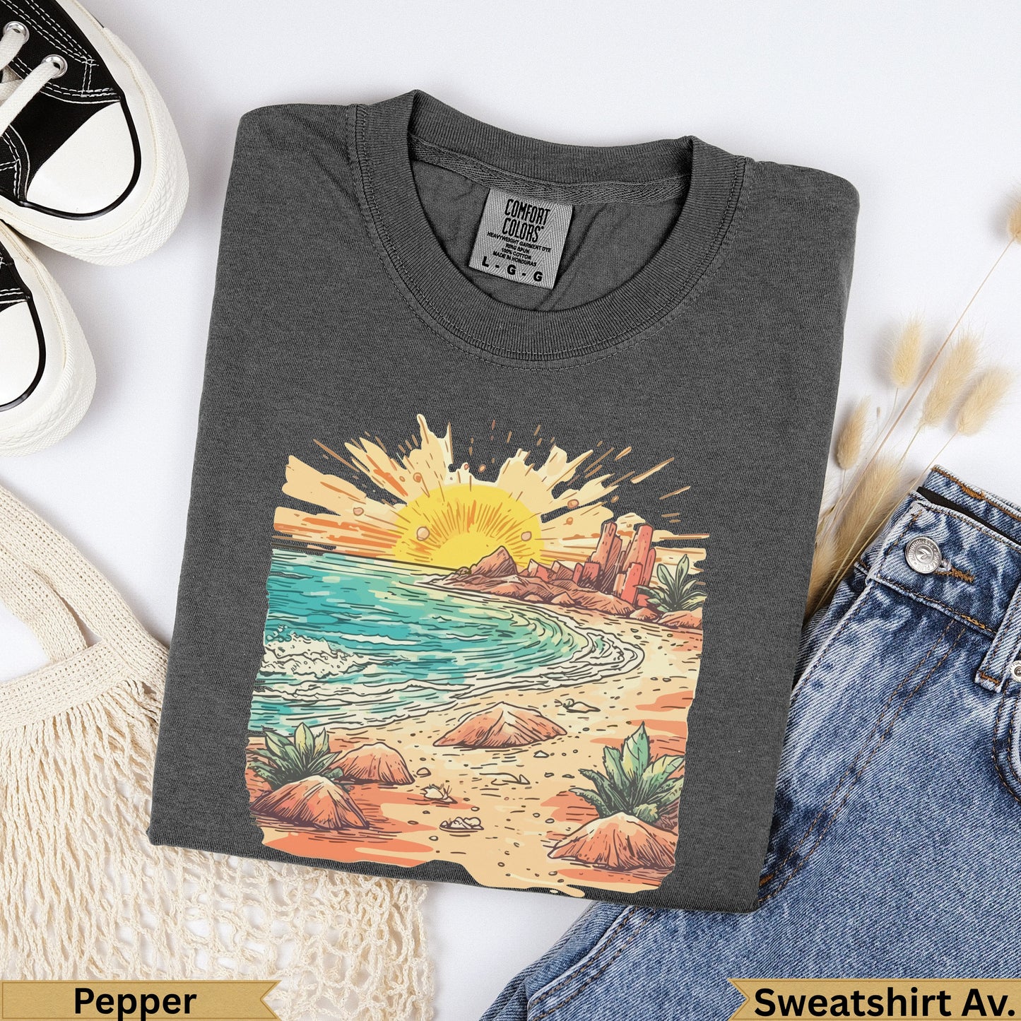 Dark grey Comfort Colors sweatshirt with a colorful beach sunset graphic.
