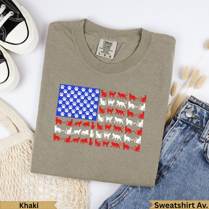 Khaki crewneck sweatshirt with an American flag design made of cats and paw prints.