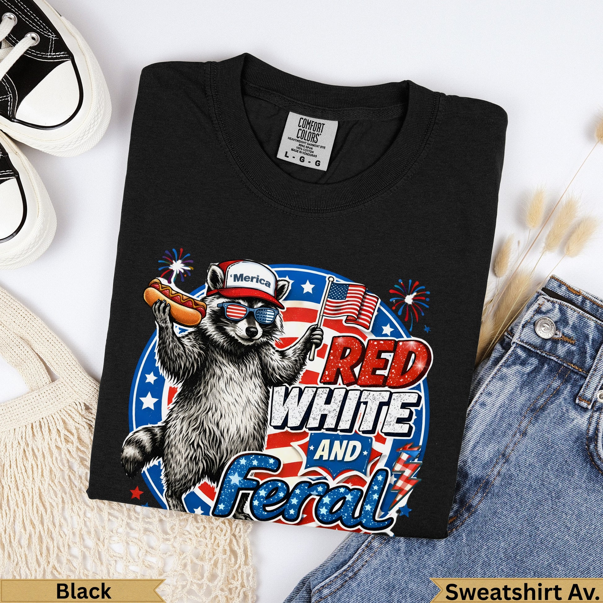 Black t-shirt with raccoon, hot dog, and "Merica Red White And Feral" text.
