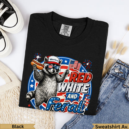 Black t-shirt with raccoon, hot dog, and "Merica Red White And Feral" text.