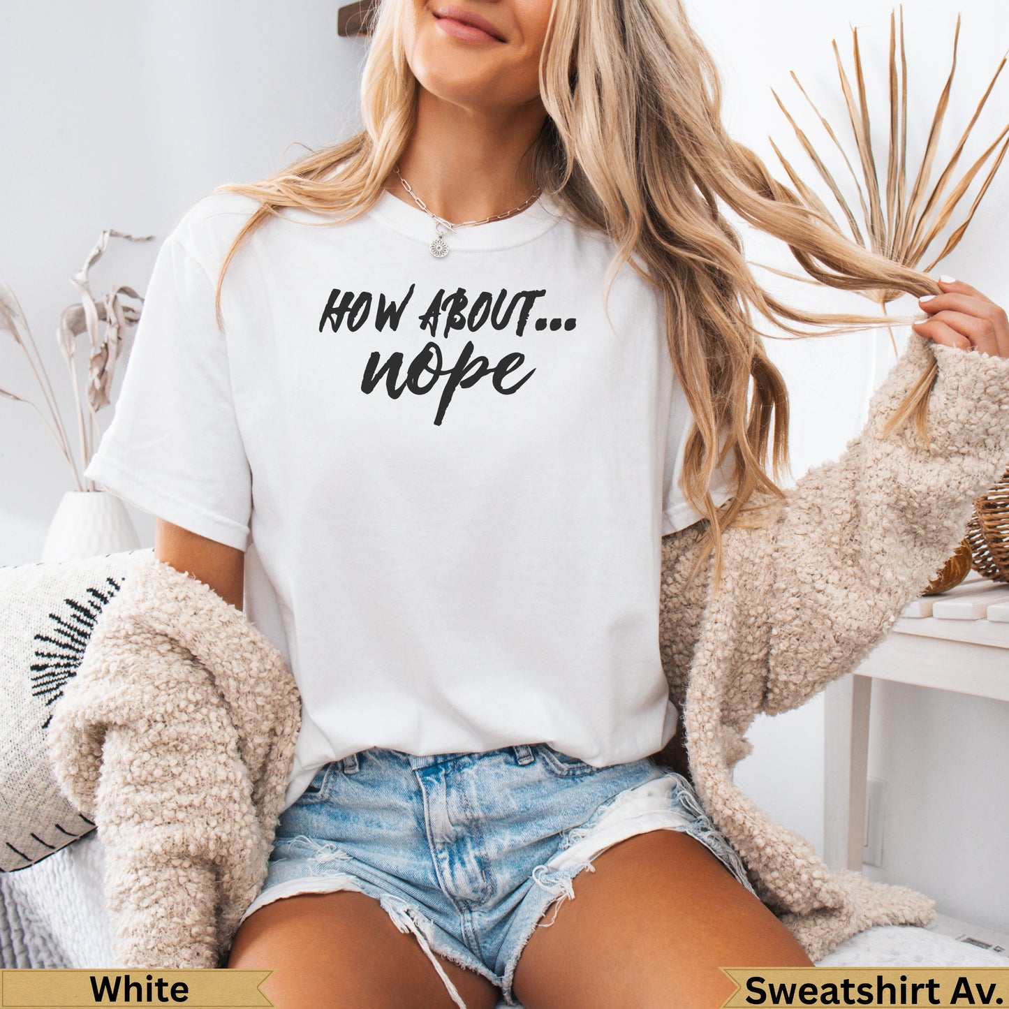 White t-shirt with "How about... nope" graphic, worn by a model.