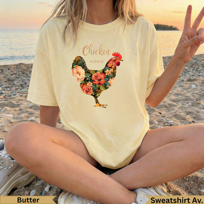 Light yellow t-shirt with "Chicken Mama" text and floral rooster graphic.