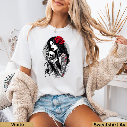T-shirt with tattooed woman holding a skull, red rose in hair.