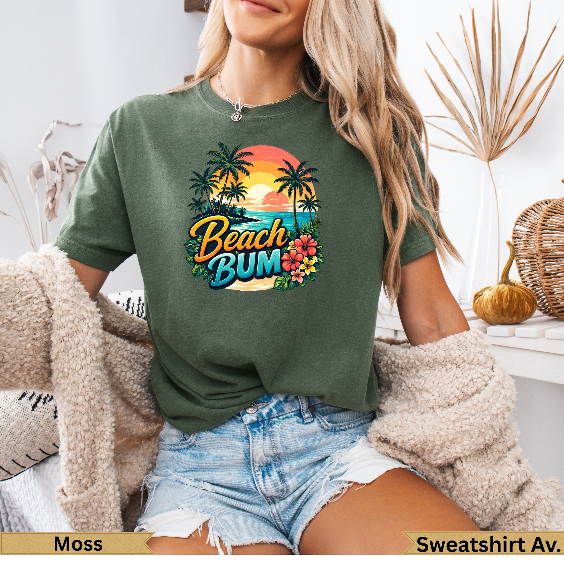 Green t-shirt with "Beach Bum" text and tropical sunset graphic.