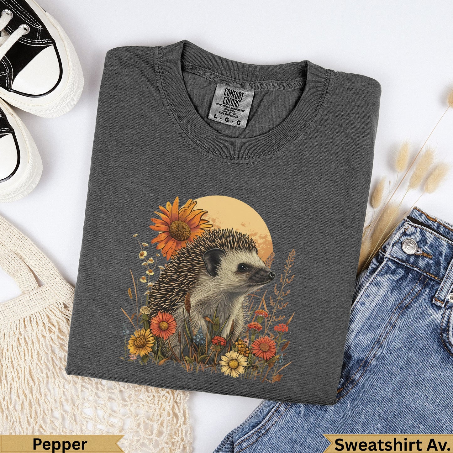 Charcoal t-shirt with hedgehog and floral design, "Pepper" and "Sweatshirt Av." text.