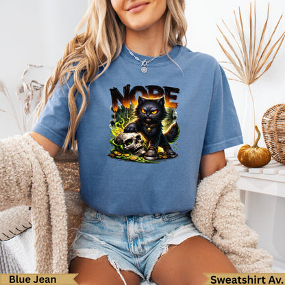 Blue t-shirt with "NOPE" text, black cat, skull, and coins graphic.