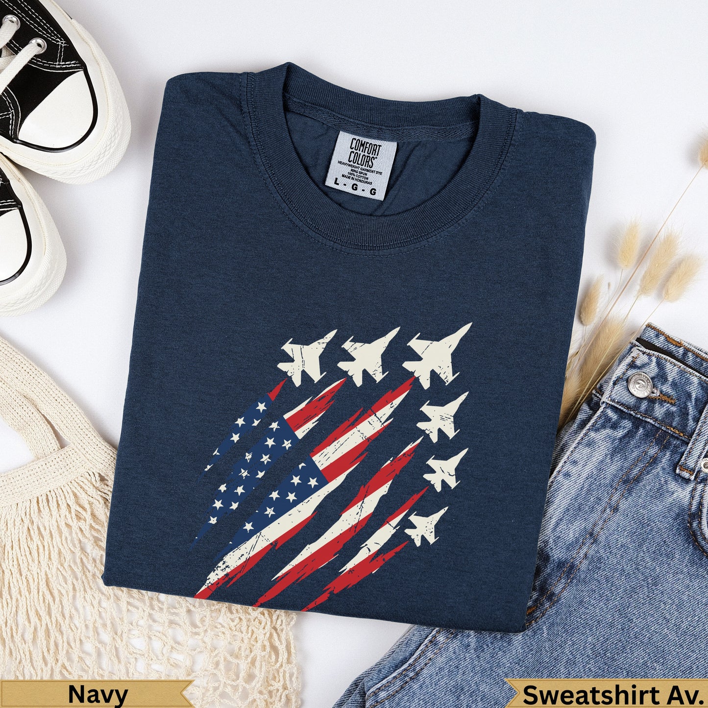 Navy t-shirt with distressed American flag and fighter jets graphic.