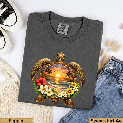 Dark grey t-shirt with a tropical sunset scene featuring a sea turtle and flowers.