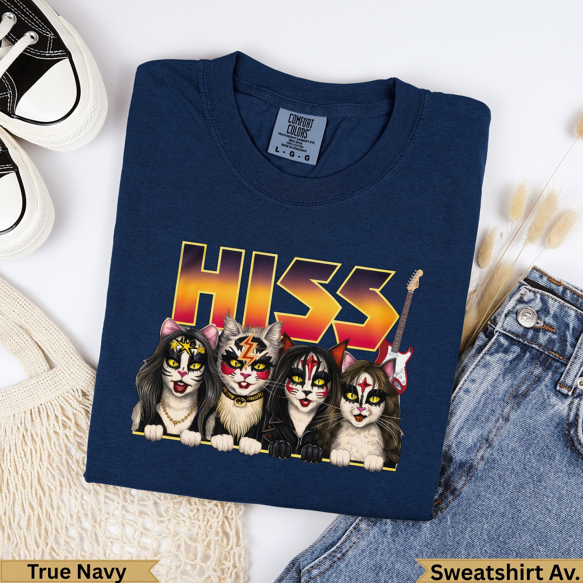 Four anthropomorphic cats in Kiss-style makeup and costumes, with "HISS" text above.