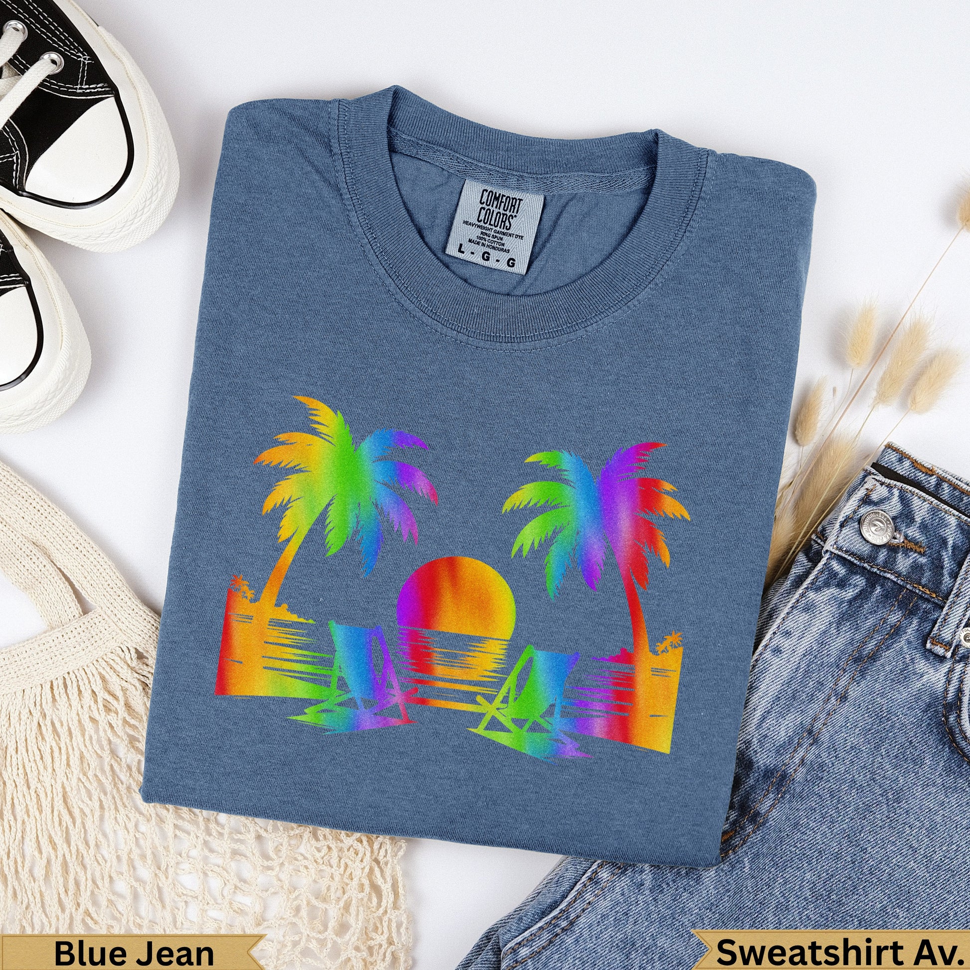 Blue Jean Comfort Colors sweatshirt with rainbow palm trees and sunset graphic.