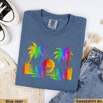 Blue Jean Comfort Colors sweatshirt with rainbow palm trees and sunset graphic.