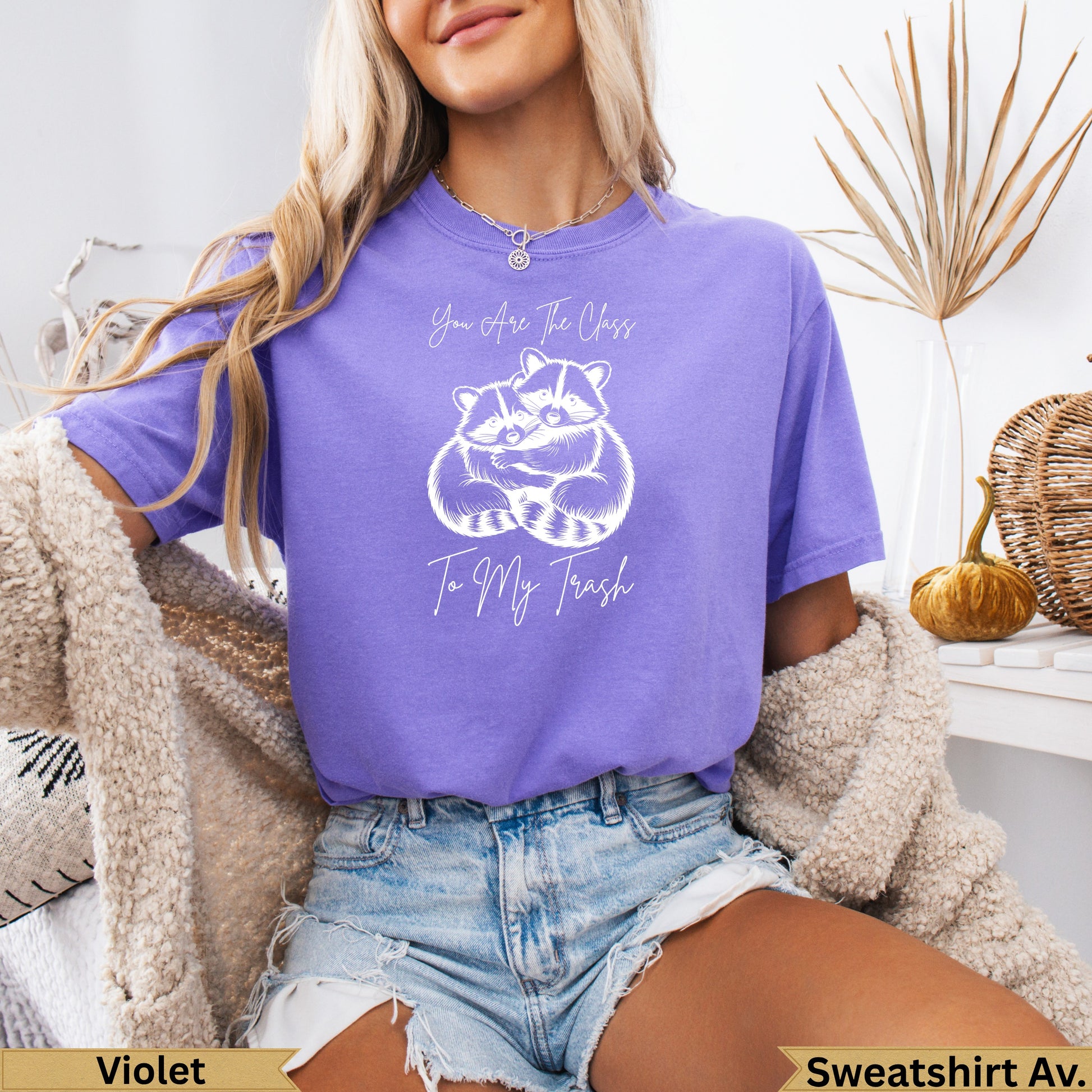 Purple t-shirt with raccoons and "You Are The Class To My Trash" text.