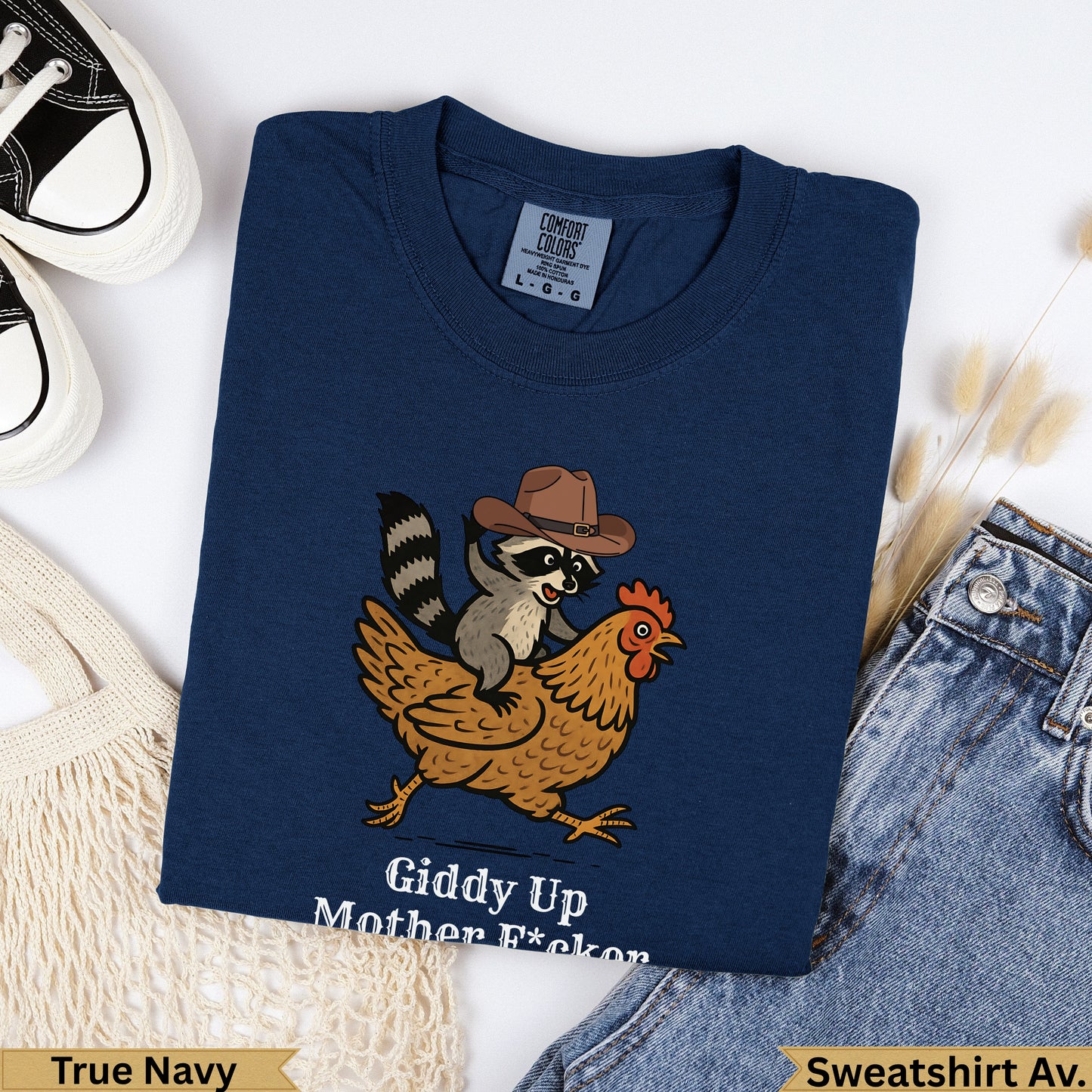 Navy cotton t-shirt with raccoon on chicken, "Giddy Up Mother F*ckon" text.