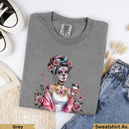 Grey sweatshirt with a woman's skull face in Dia de los Muertos style.