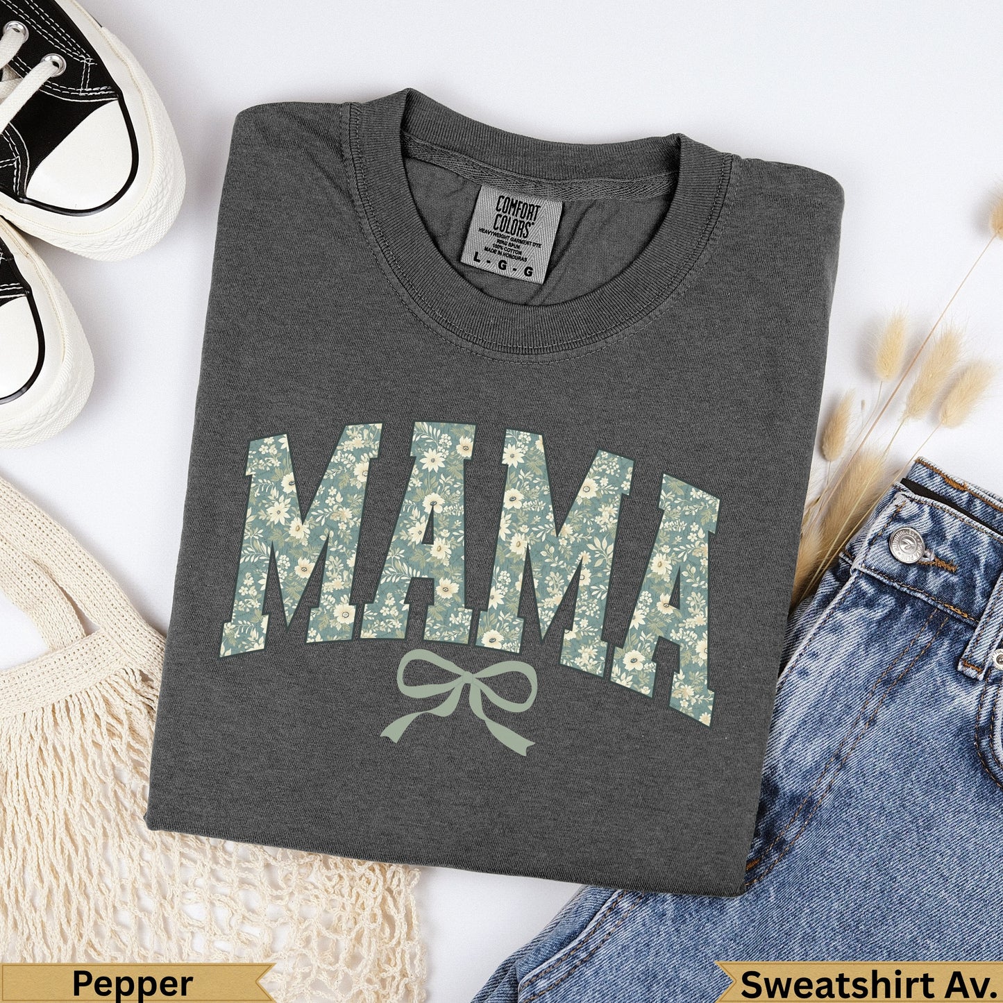 Dark gray "MAMA" graphic sweatshirt with floral pattern and bow.
