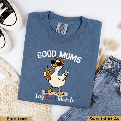 Blue t-shirt with cartoon goose wearing sunglasses saying "Good Moms Say Bad Words."