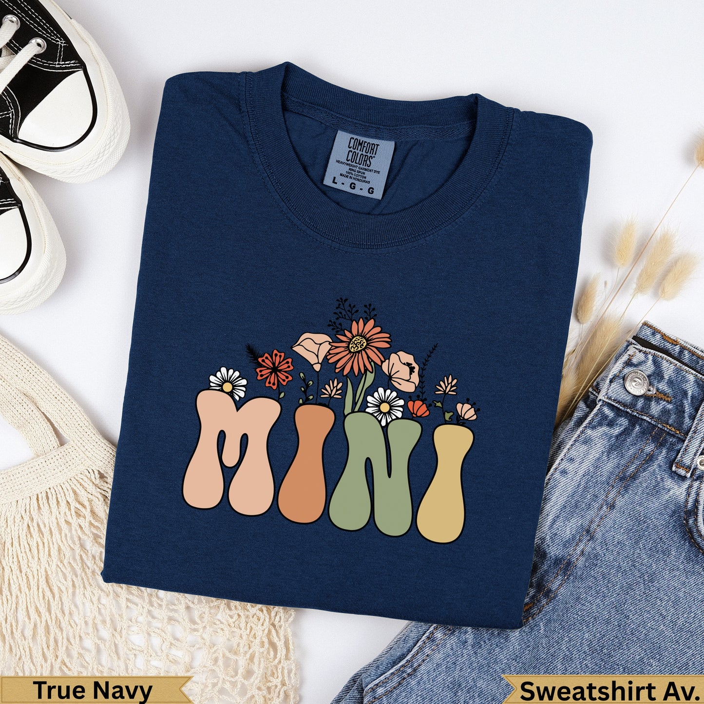 Navy sweatshirt with "MINI" in colorful retro lettering and floral bouquet.