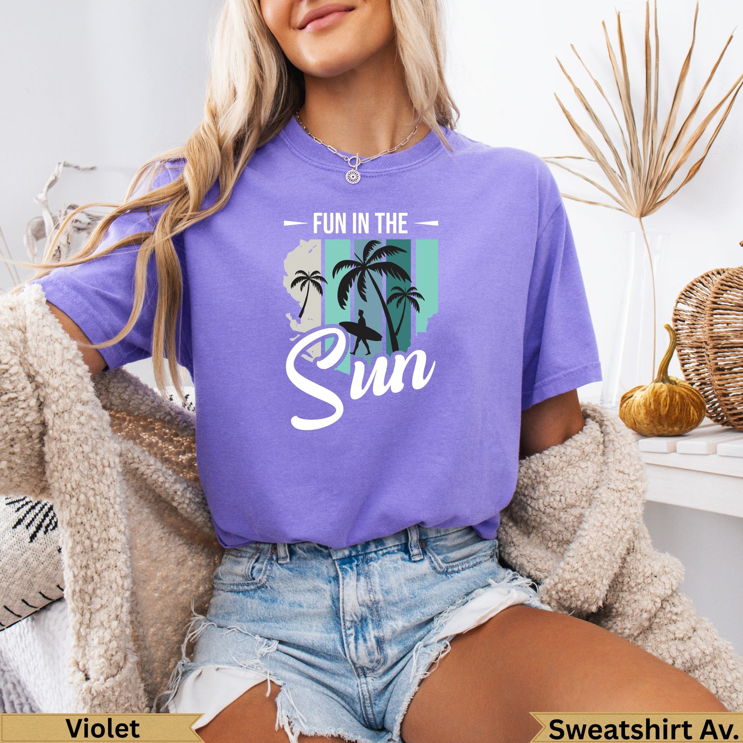 Purple t-shirt with "Fun in the Sun" and palm trees graphic.