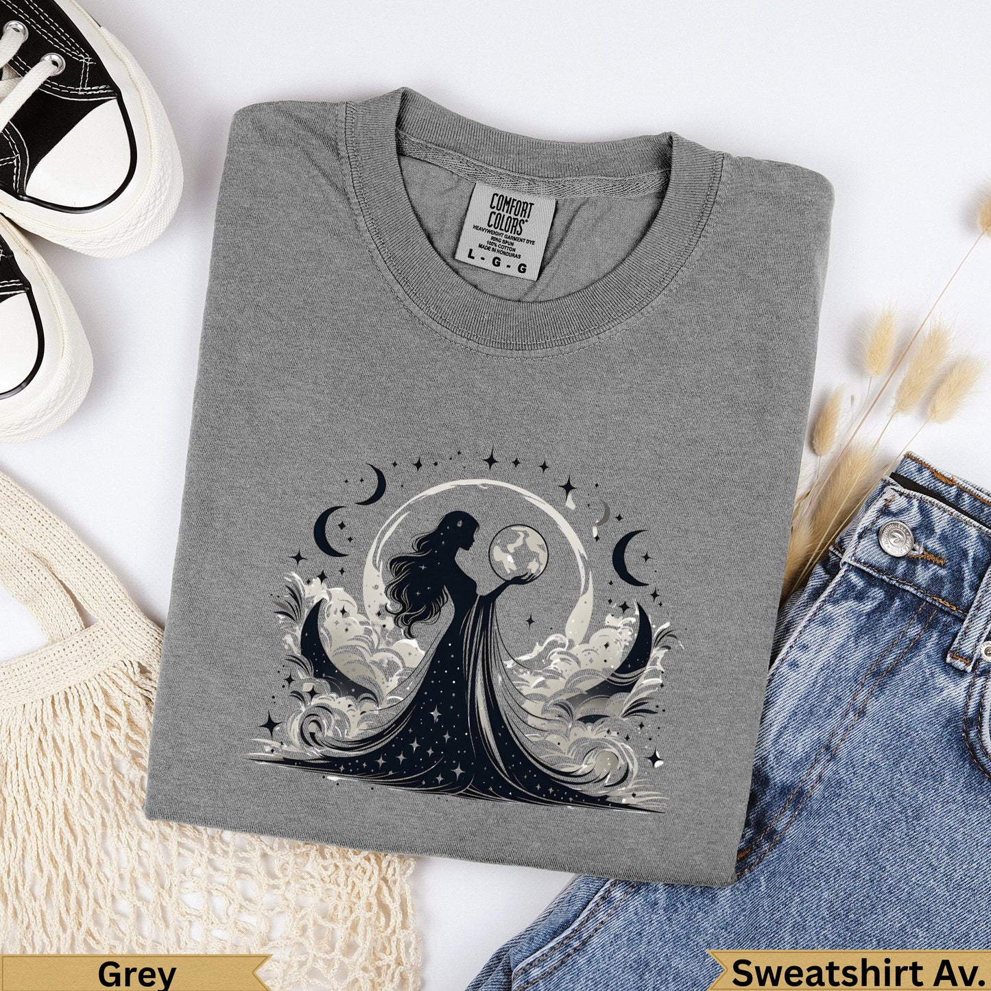 Grey crewneck sweatshirt with celestial woman and moon graphic.