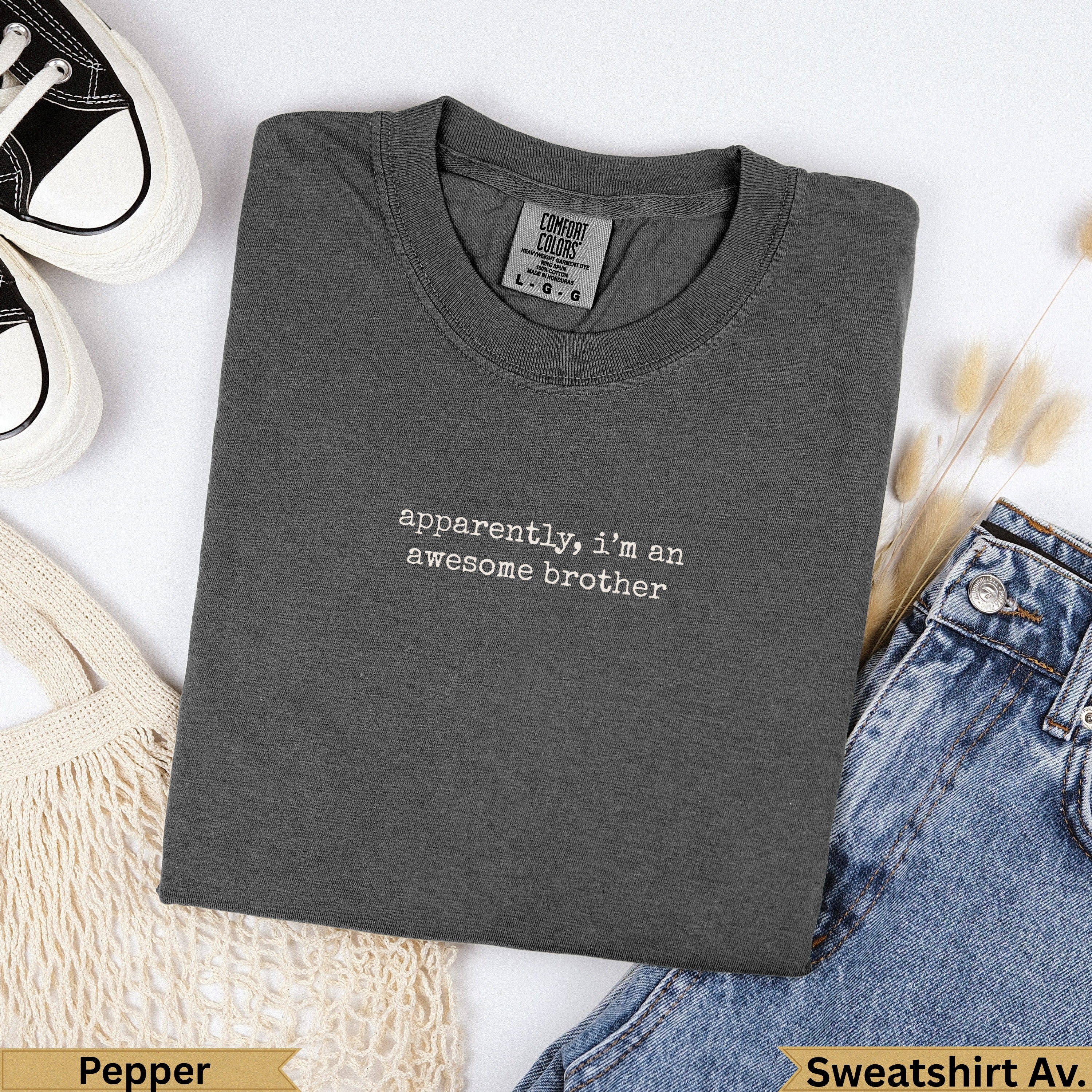 Dark grey Comfort Colors sweatshirt with "apparently, i'm an awesome brother" text.