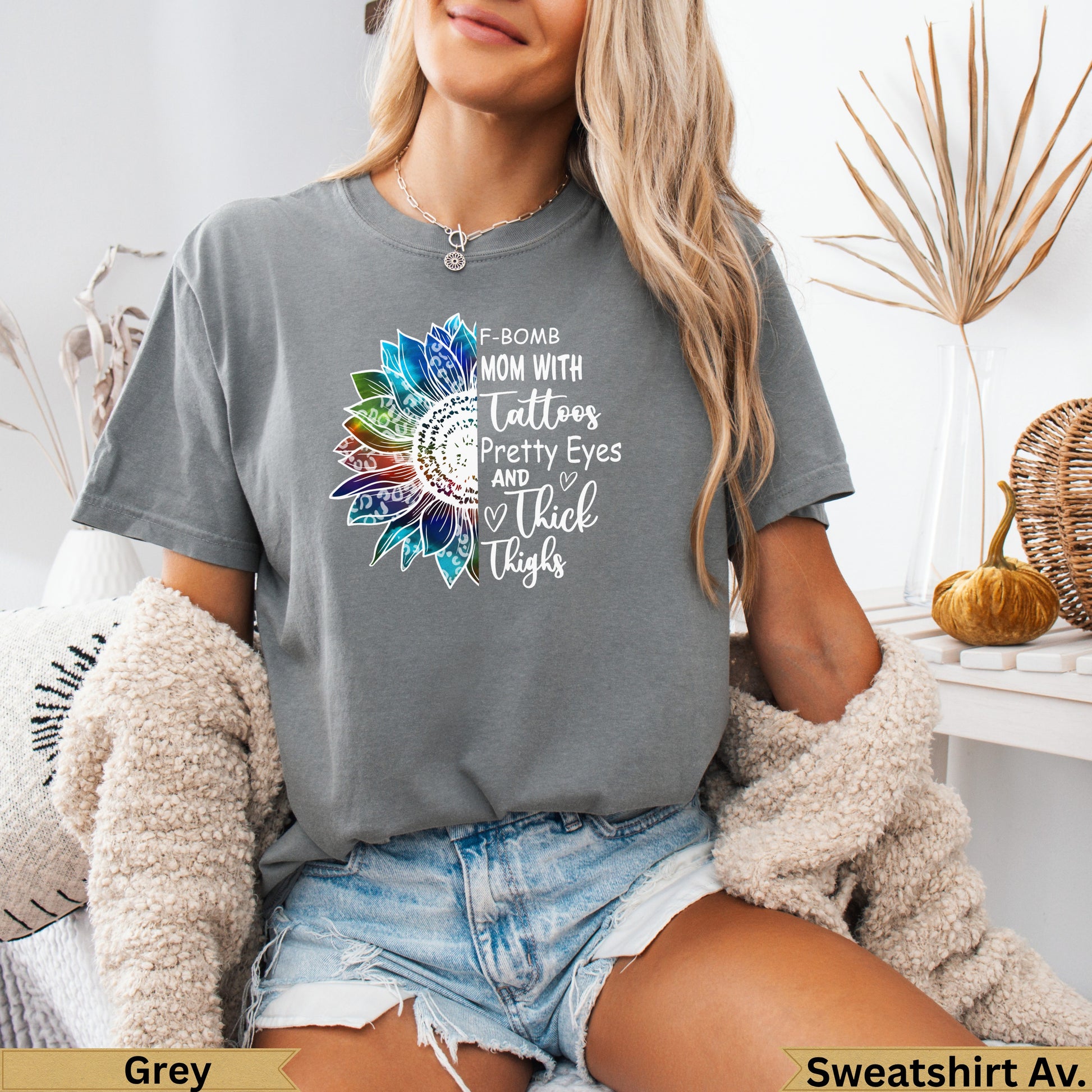 Grey t-shirt with sunflower graphic and empowering text about moms.
