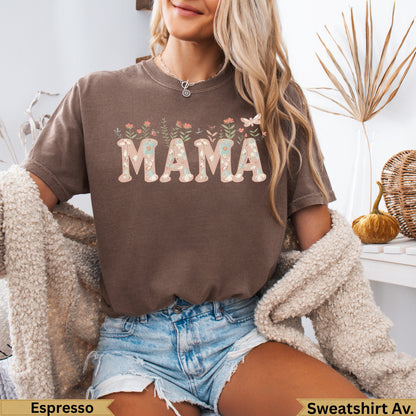 Brown t-shirt with "MAMA" printed in floral lettering.