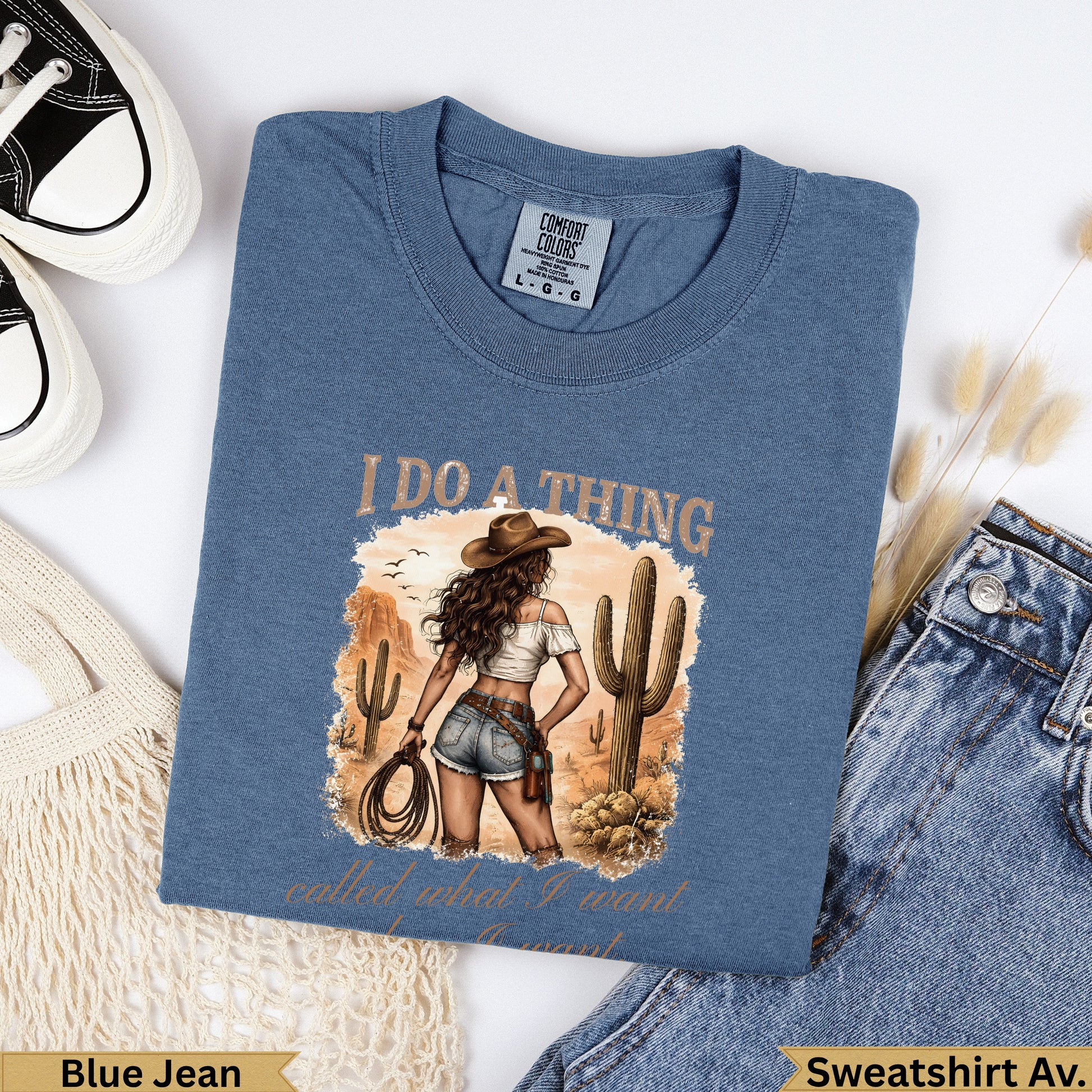 Blue t-shirt with "I do a thing called what I want" graphic.