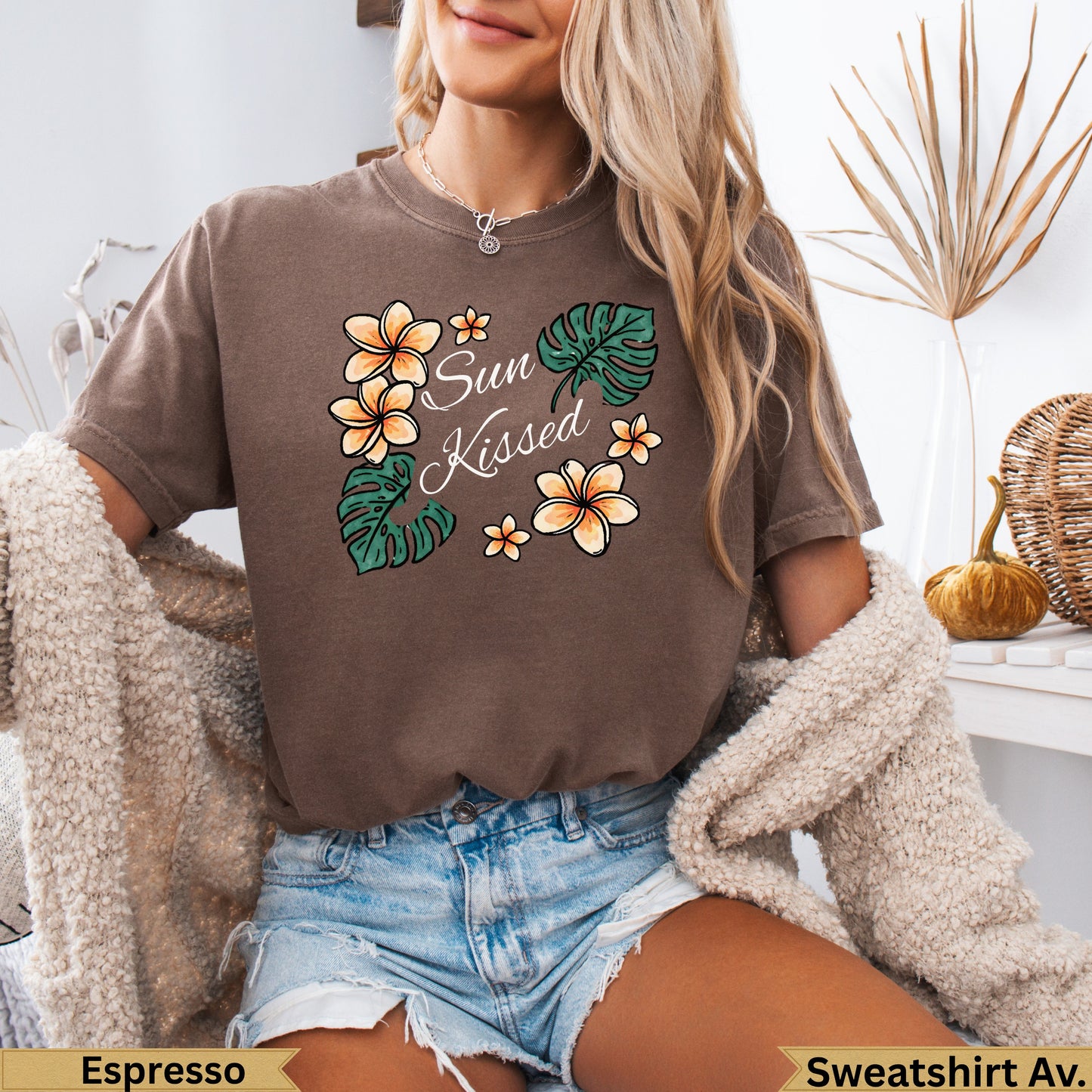 Brown t-shirt with floral design and "Sun Kissed" text.