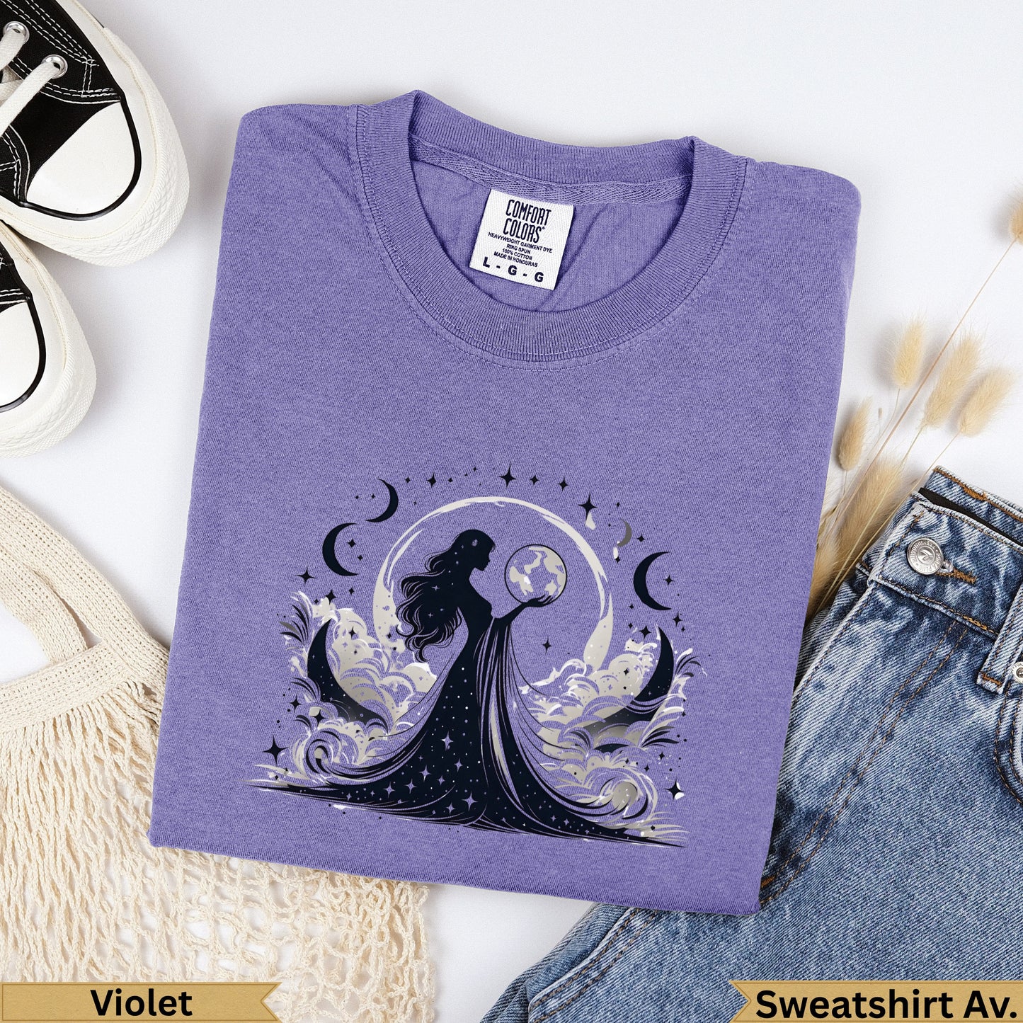 Purple Comfort Colors sweatshirt with celestial moon and woman graphic.