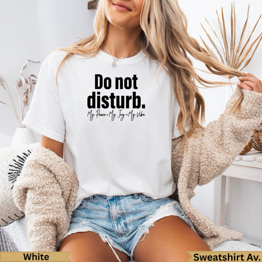 White crewneck sweatshirt with "Do not disturb. My Peace. My Joy. My Vibe." text.