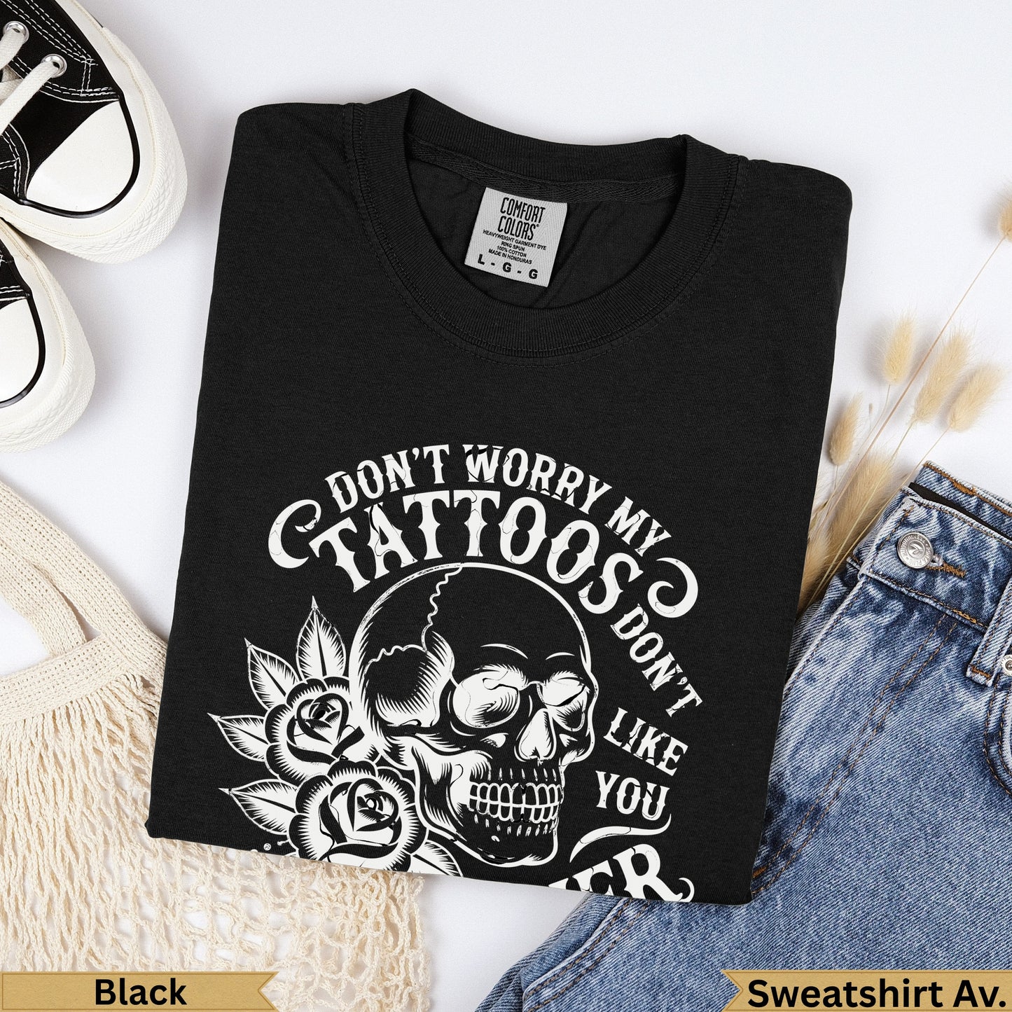 Black Comfort Colors t-shirt with skull and roses graphic, "Don't worry my tattoos don't like you".