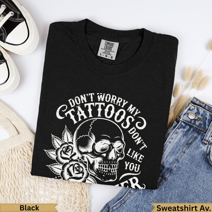 Black Comfort Colors t-shirt with skull and roses graphic, "Don't worry my tattoos don't like you".