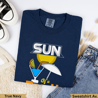 Navy blue Comfort Colors sweatshirt with "SUN of a..." graphic and a small white umbrella.
