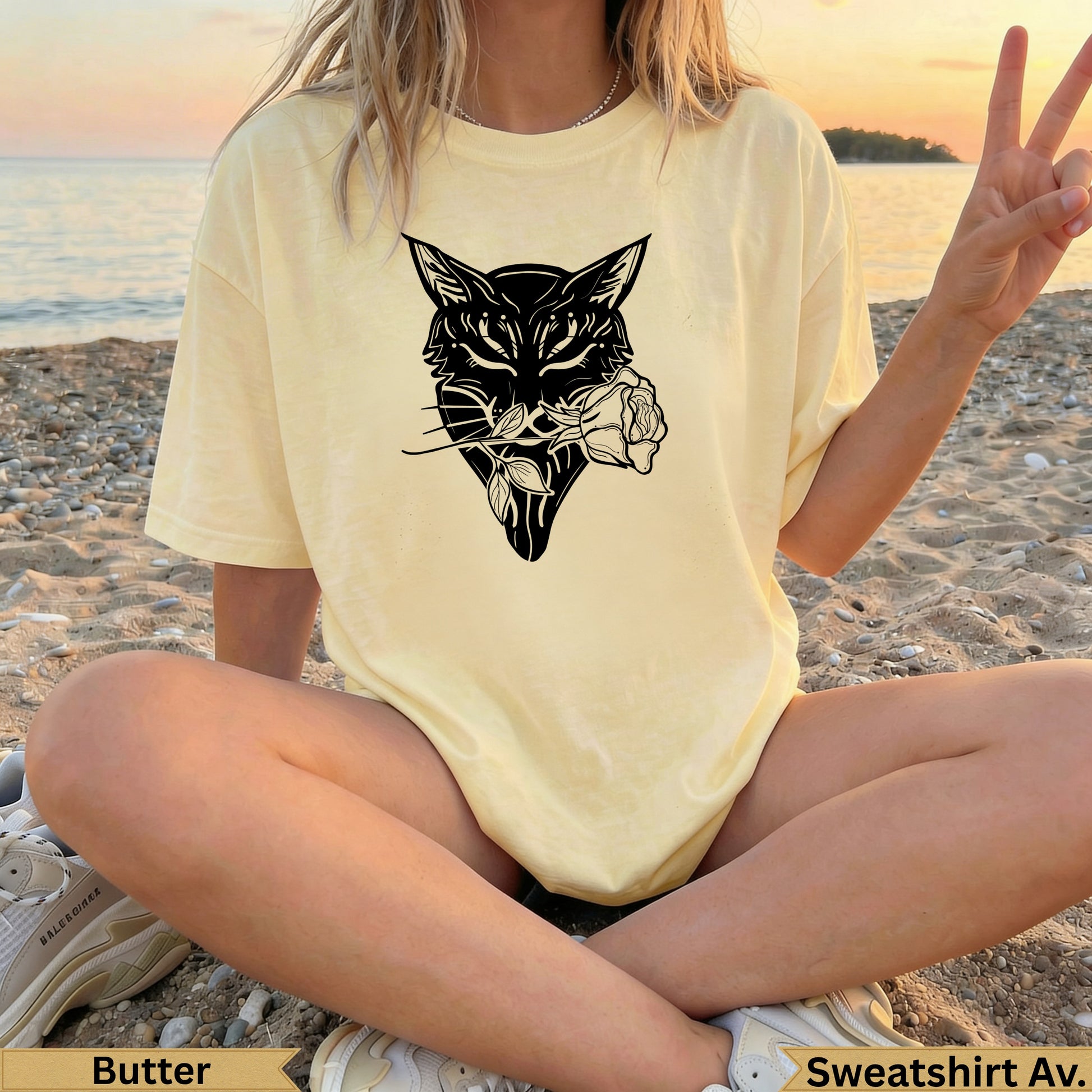 Cream t-shirt with black wolf and rose graphic, "Butter" and "Sweatshirt Av." text.