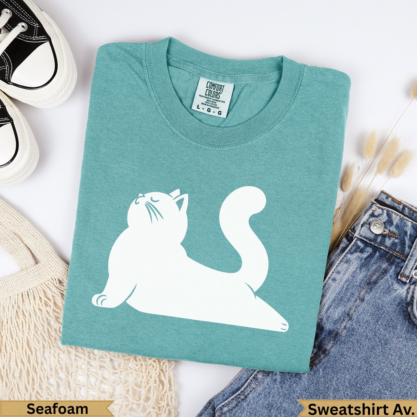 Seafoam Comfort Colors t-shirt with white cat graphic and "Seafoam" text.