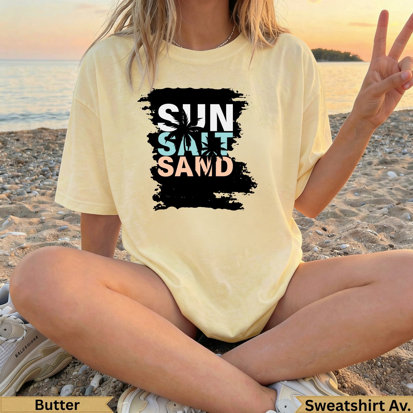 Butter yellow crewneck t-shirt with "SUN SALT SAND" graphic.