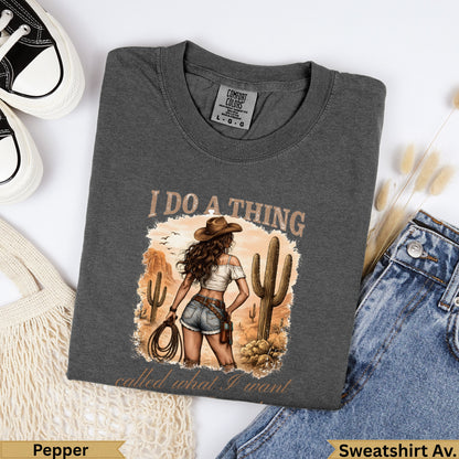 Graphic t-shirt with desert scene and text "I do a thing called what I want."